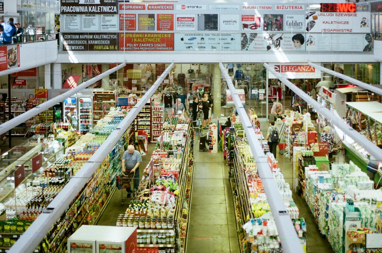 A busy indoor market seen from above